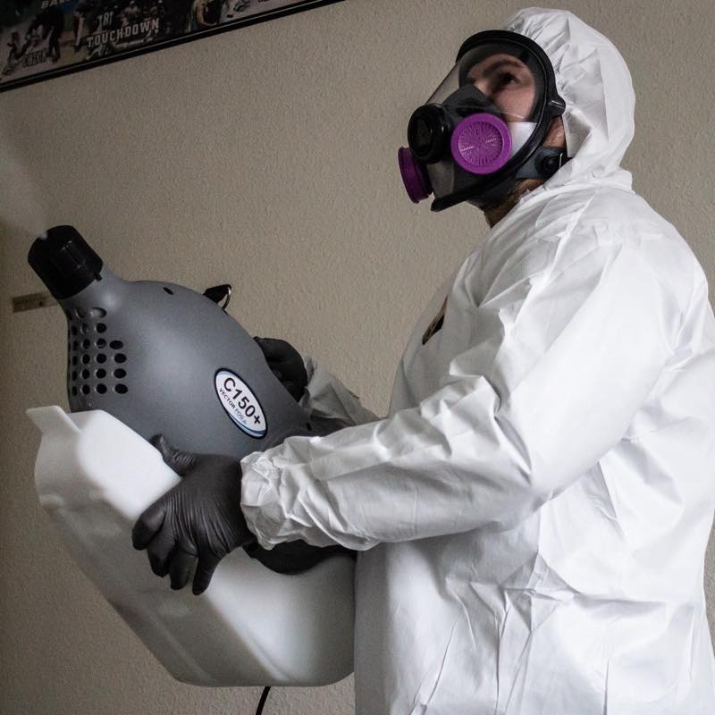 Carlos Ramirez in full protective equipment on a remediation job